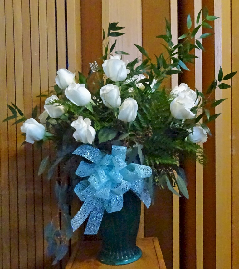 Flowers from Sherry and Wayne Board, Bonnie and Kenny Hiles, and 
Steve, Dan, Delbert, and Richard Fortin