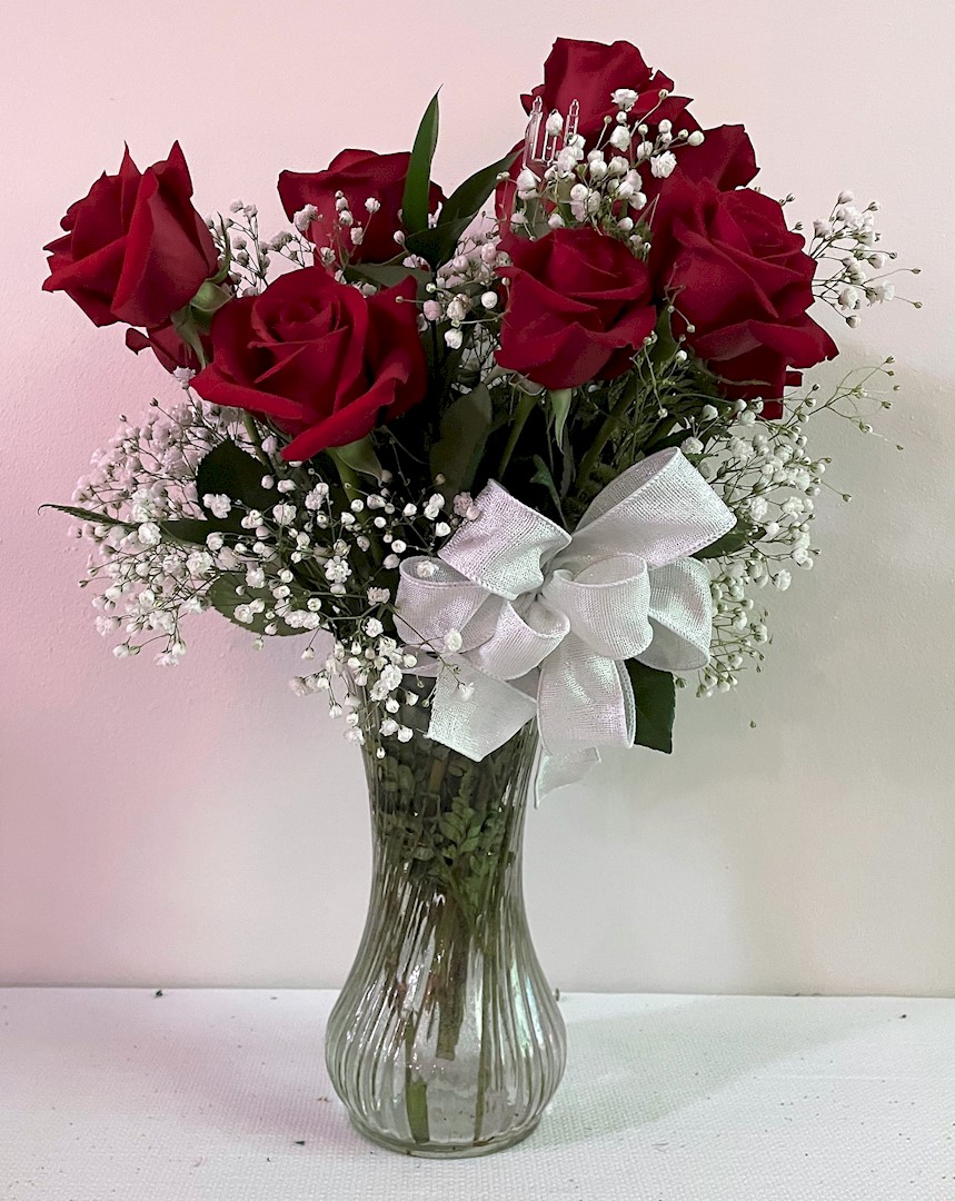 Flowers from Larry and Ann; Doug and Christy; Nicholas and Samantha; and Stacy and Chelsea