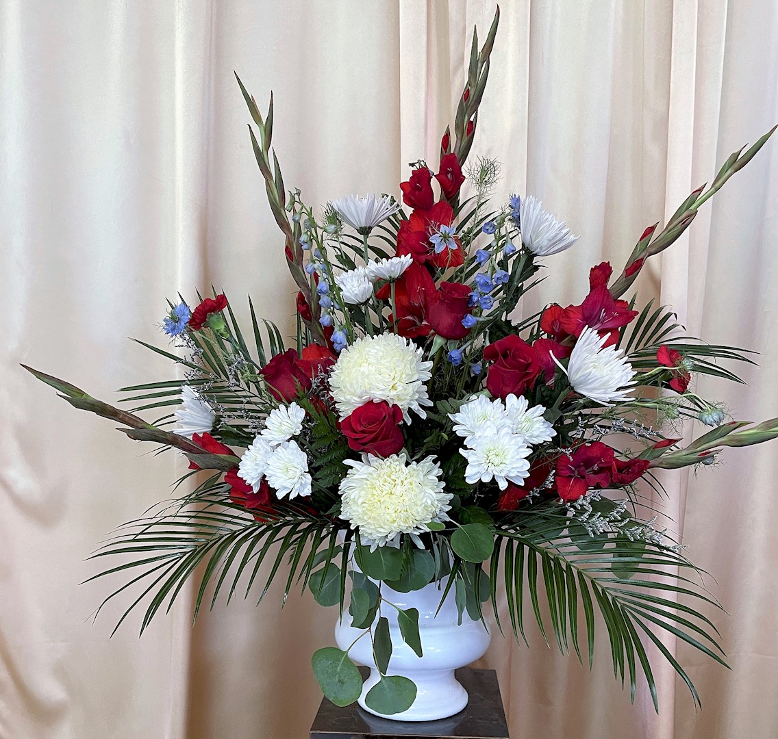 Flowers from Cory and Jenifer; Matthew, Marcus, and Mitchell Reisdorf; and Leanne and Mike Grover