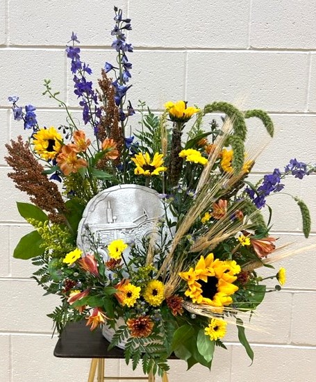 Flowers from Mike and Janet Schoniger; Bruce and Ann Schoniger; and Mary and Tracy Ragland