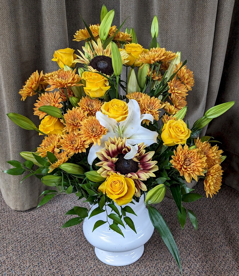 Flowers from Keith, Edith, and Families; Mary Alice and Families; Kathy, Greg, and Families; and Laurie, Ron, and Families