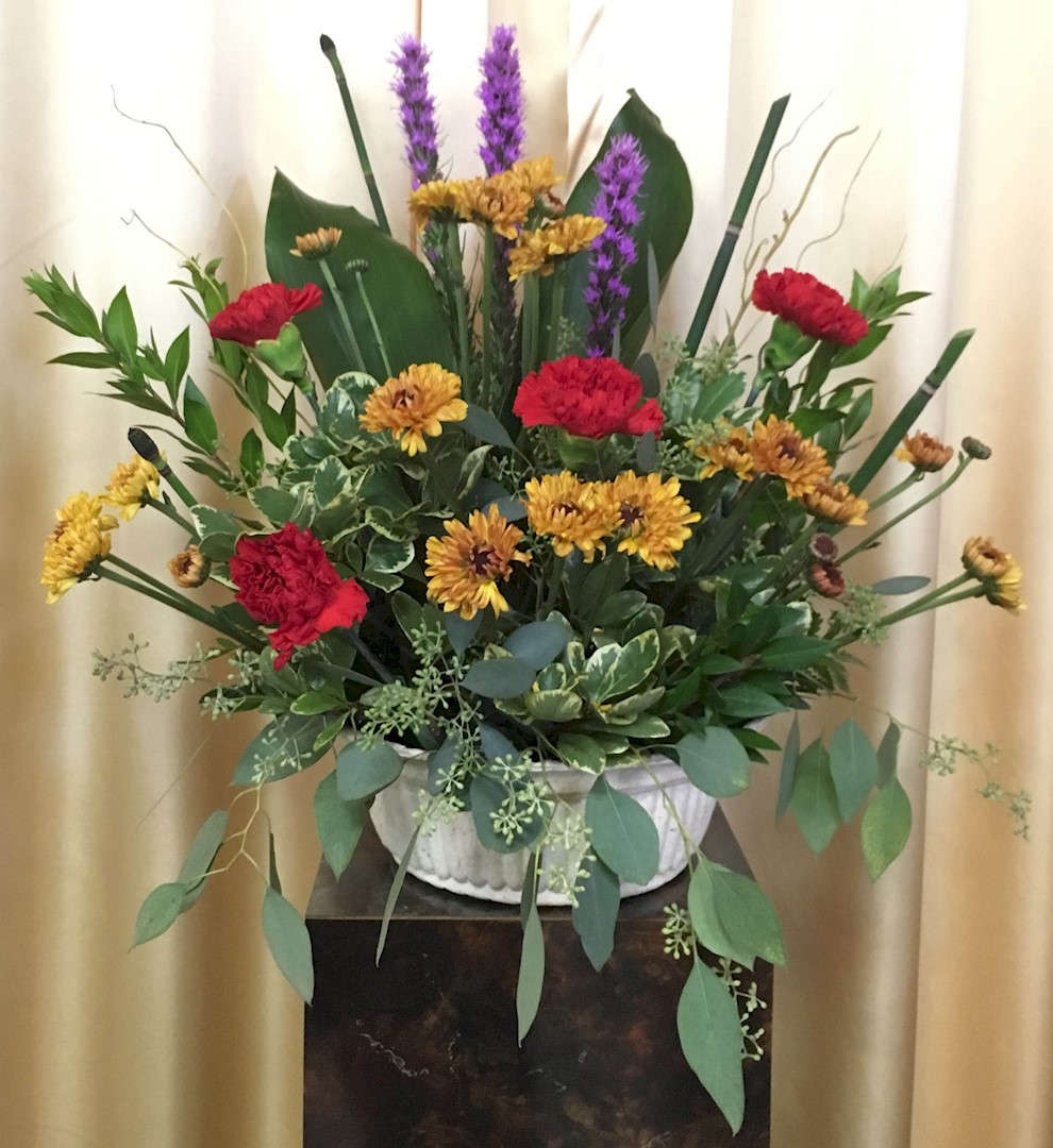 Flowers from Jim and Kathy Rock, Brandon and Sanna Rock and Family, Brice Rock and Family, and Bailey and Preston Patterson and Family