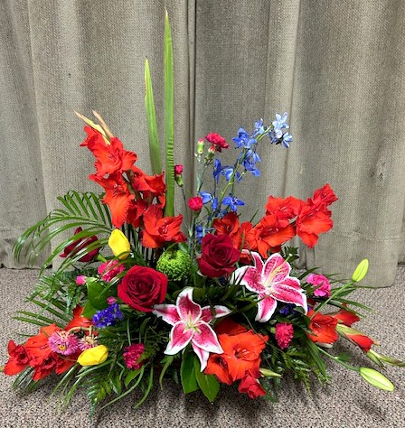 Flowers from Ralph and Cathy; Lynette, Don, Caitlin, Tessa, and Hannah; and Sherry, Eric, Elsie, and Loman